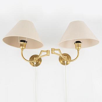 A pair of brass wall lamps, EWÅ, later part of the 20th century.