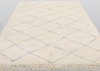 A Moroccan carpet, ca 345 x 240 cm.