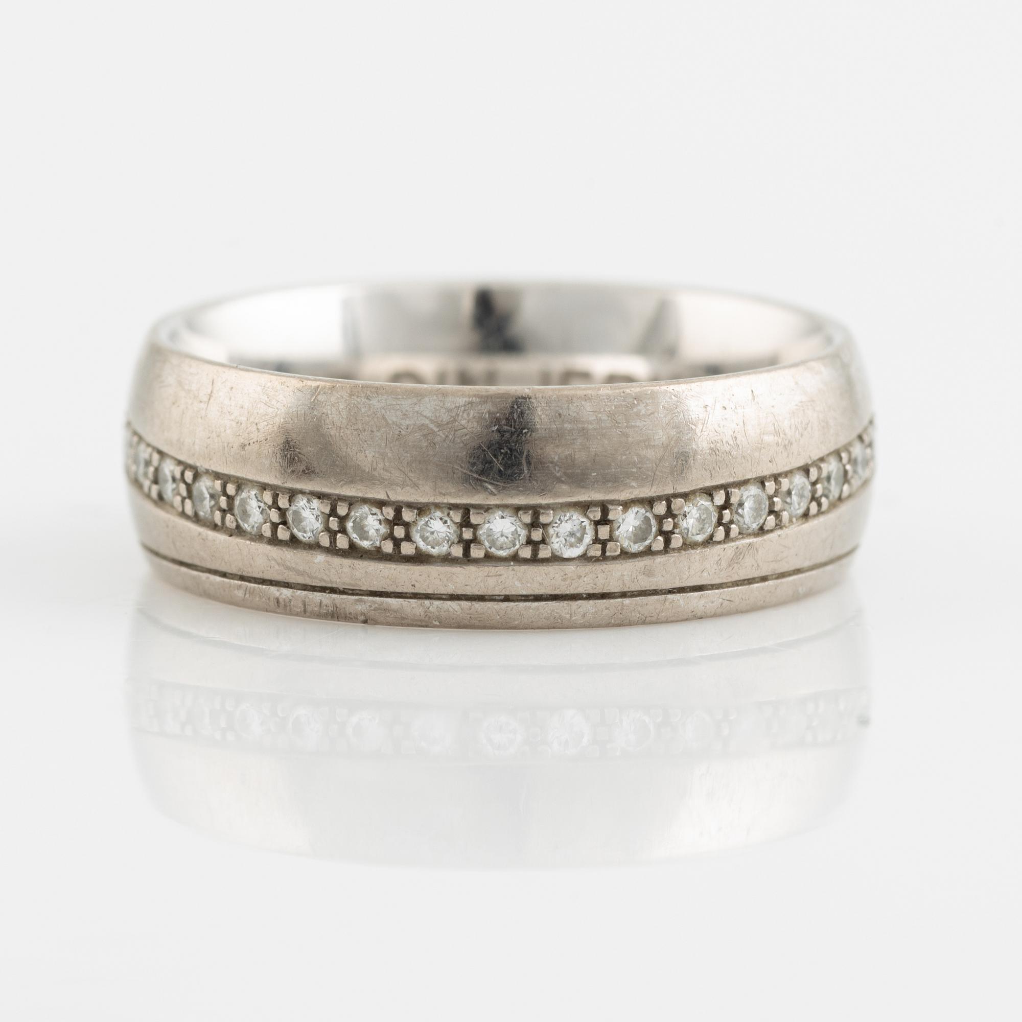 White gold and brilliant cut diamond ring.