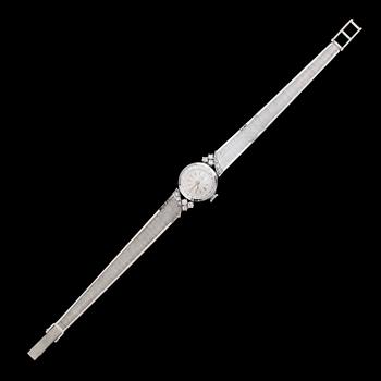 DAMARMBANDSUR, 18 k vitguld, briljantslipade diamanter tot ca 0.30 ct.