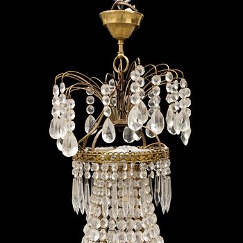 A CHANDELIER, empire-style, second half of the 20th century.