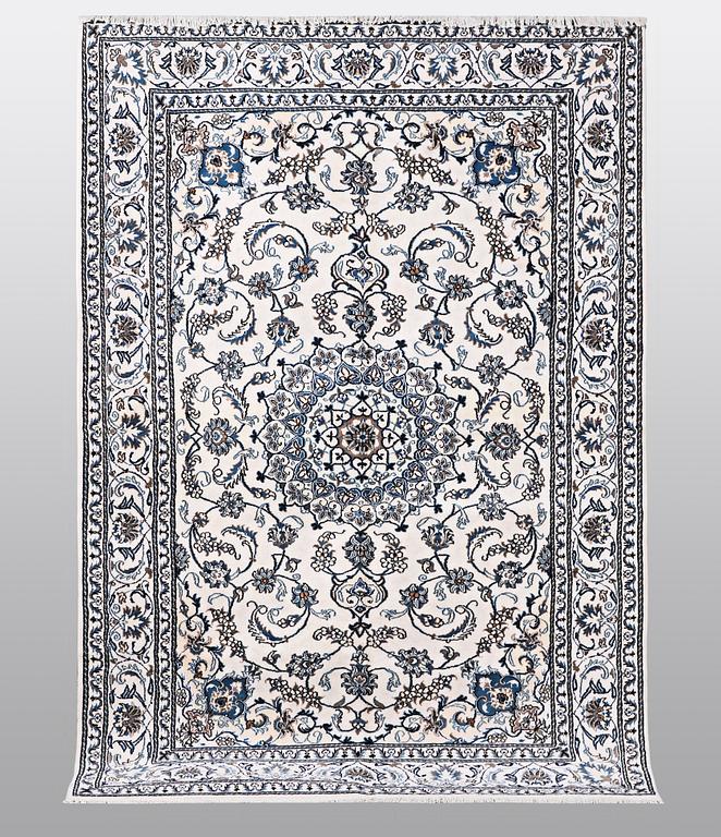 A carpet, Nain, 285 x 196 cm.