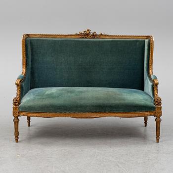 A Louis XVI-style sofa, ca 1900.