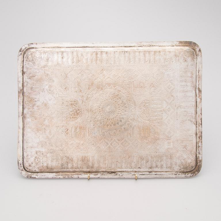 A Persian silver tray, mark of Vaspour, silver mark 84.