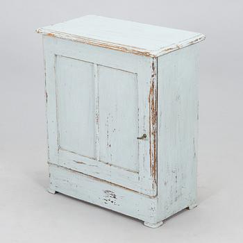A painted cabinet, circa 1900.