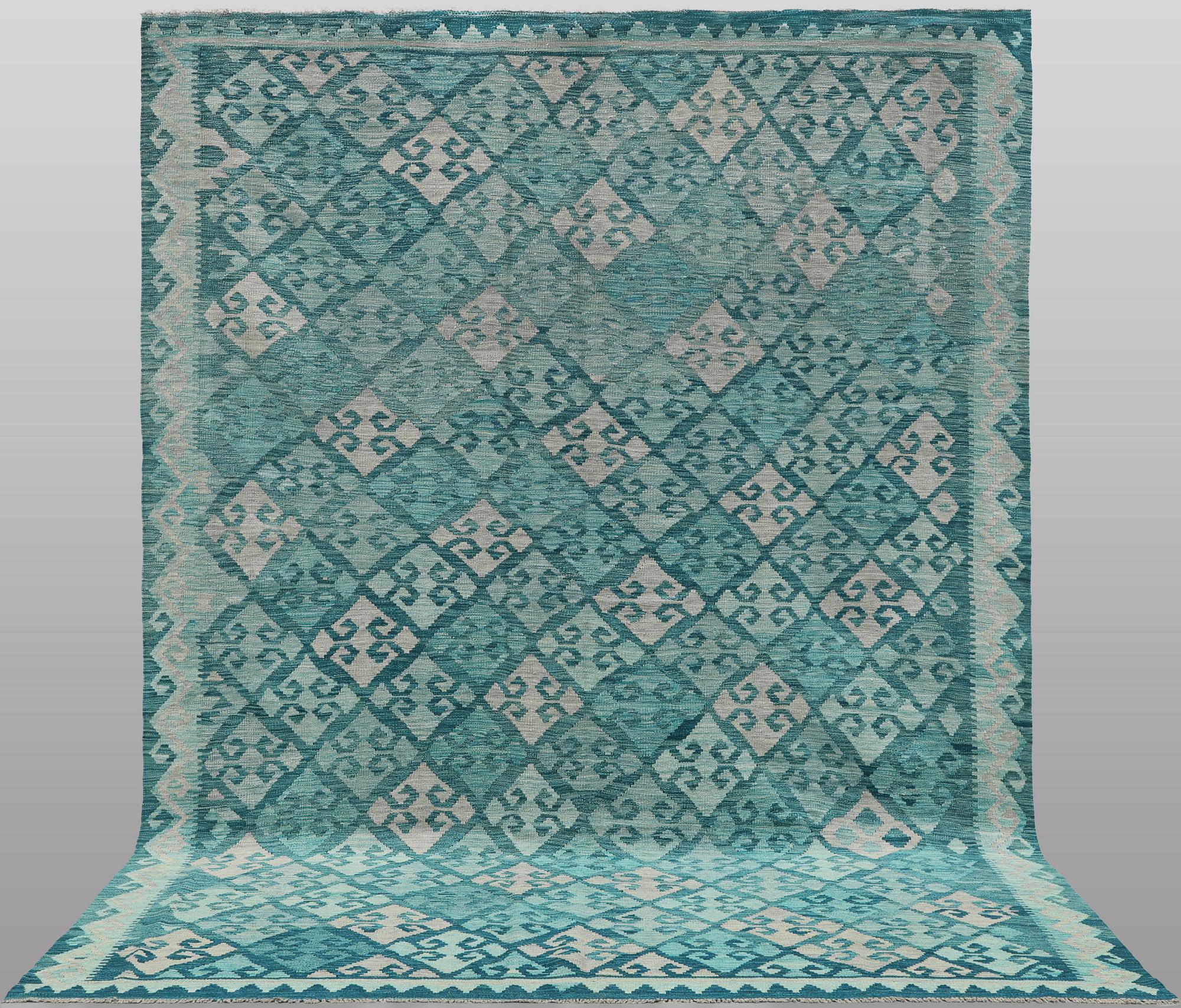 A Kelim carpet, 350 x 245 cm.