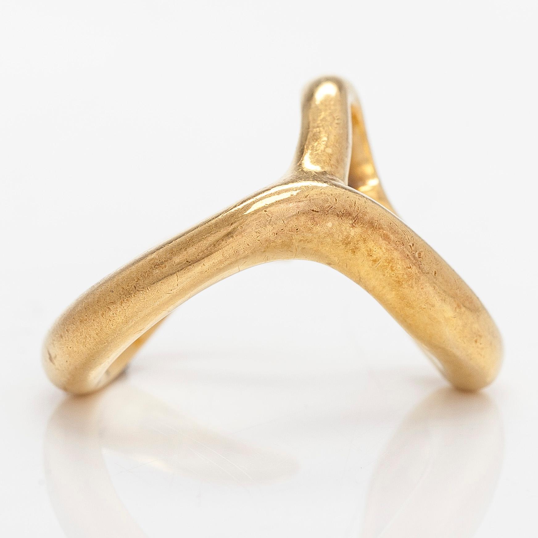 Tiffany & Co, Elsa Peretti, an 18K gold 'Open Heart' ring.