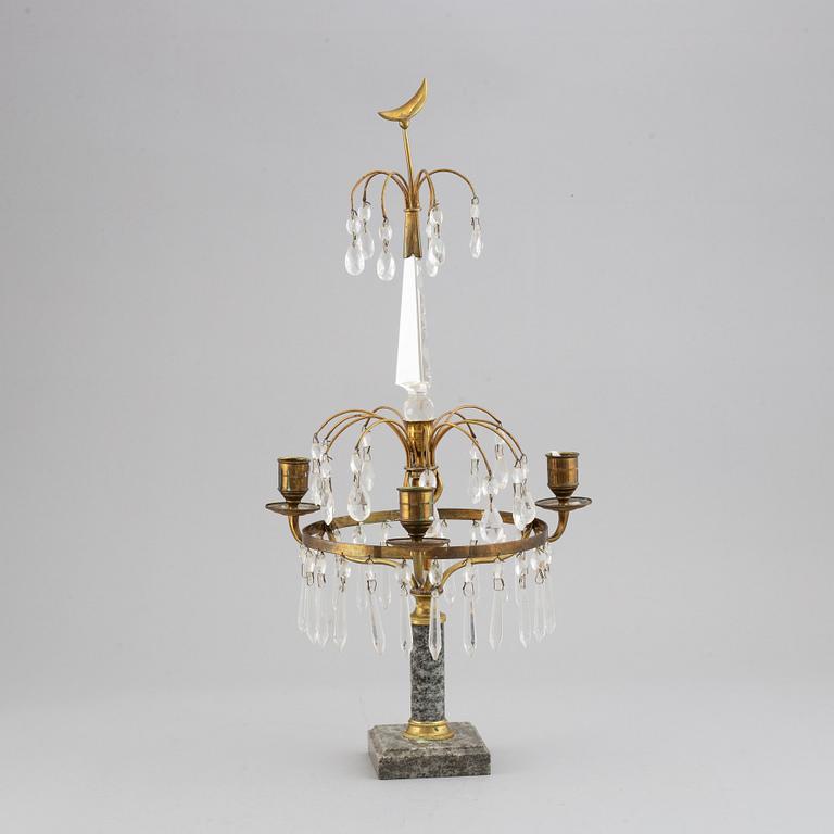 A gustavian style three-light girandole, first half of the 20th century.