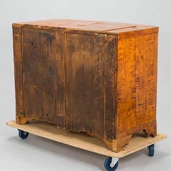 A bureau veneered in Karelian birch, mid-19th century.