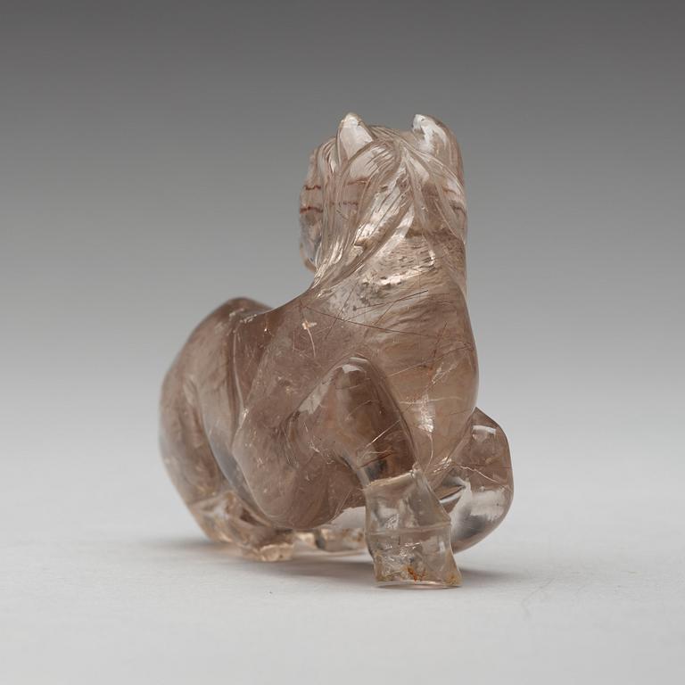 A quartz carving of a reclining horse, China.