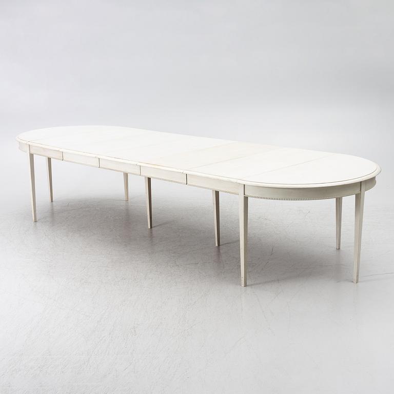 A Gustavian style dining table, late 20th Century.