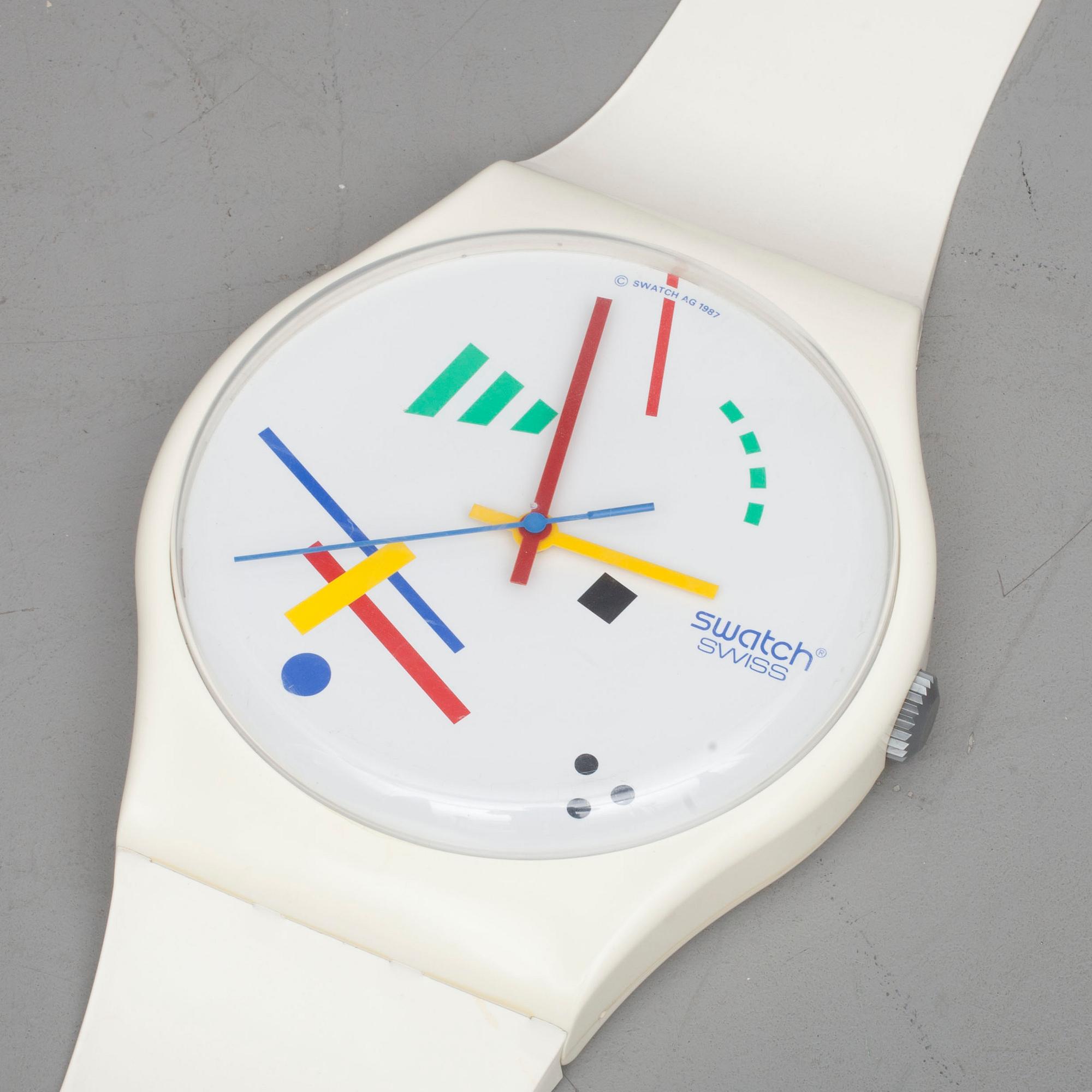 SWATCH VÄGGKLOCKA.