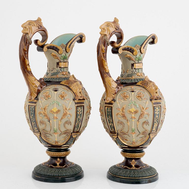 Wilhelm Schiller & Son, a pair of majolica jugs and a jardinier, Austria, early 20th Century.