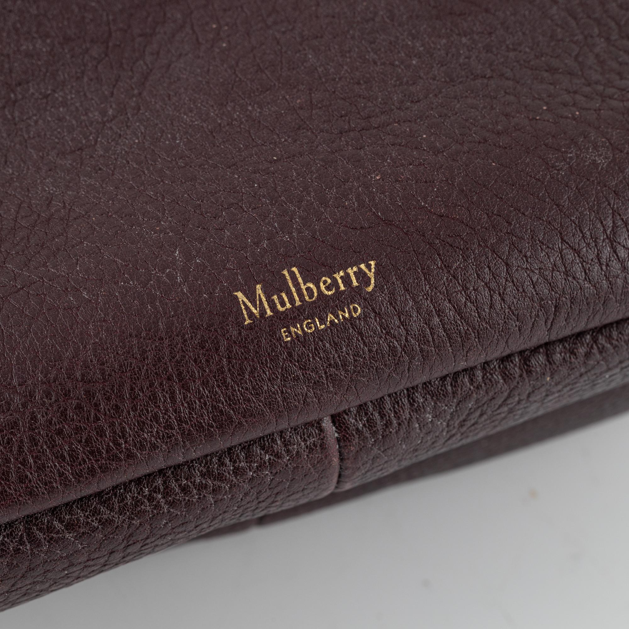 Mulberry, a burgundy leather handbag.