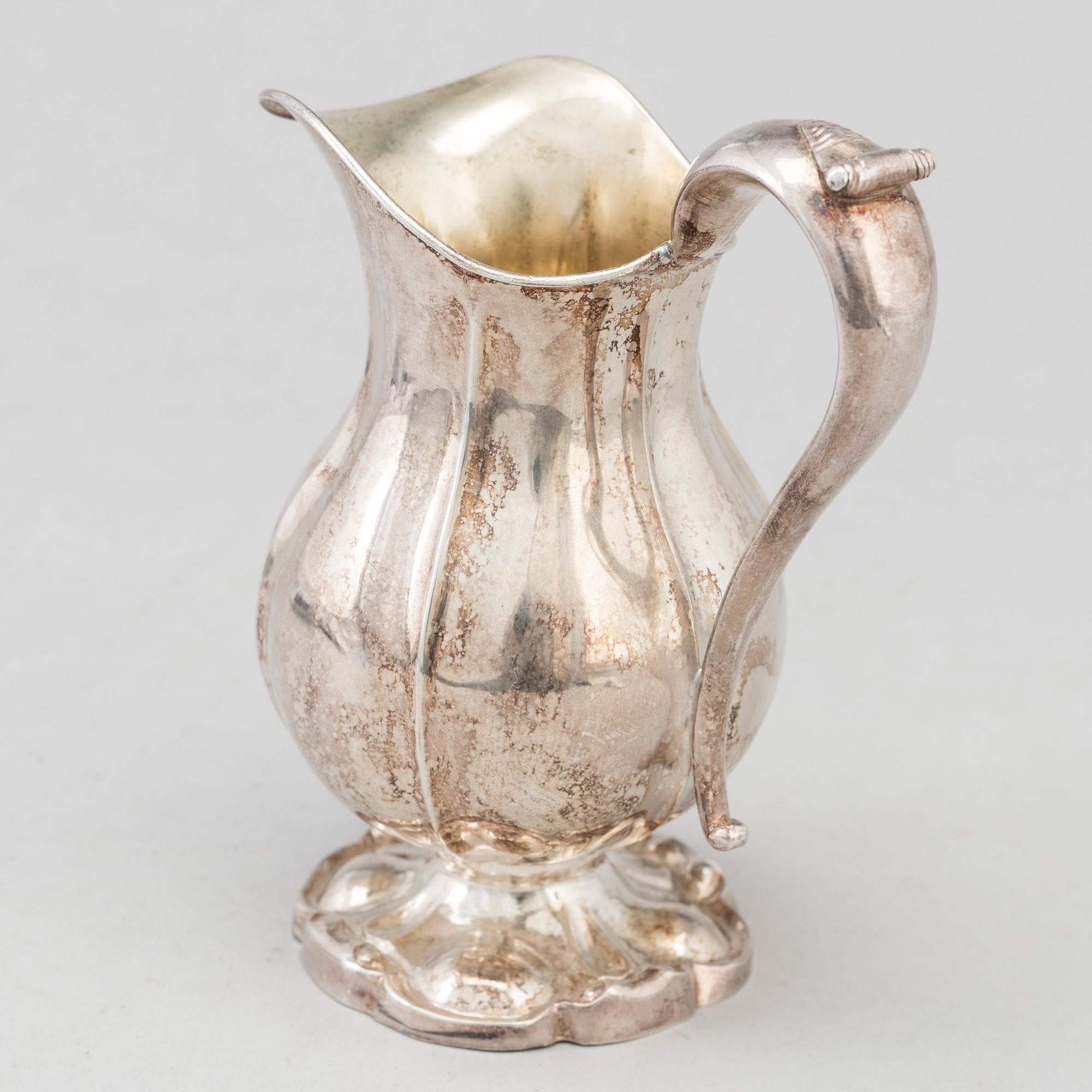 A Swedish SILVER CREAM JUG, 1857, Maker's mark Bror Erik Skogsborg, Eskistuna. Weight ca 135 g.