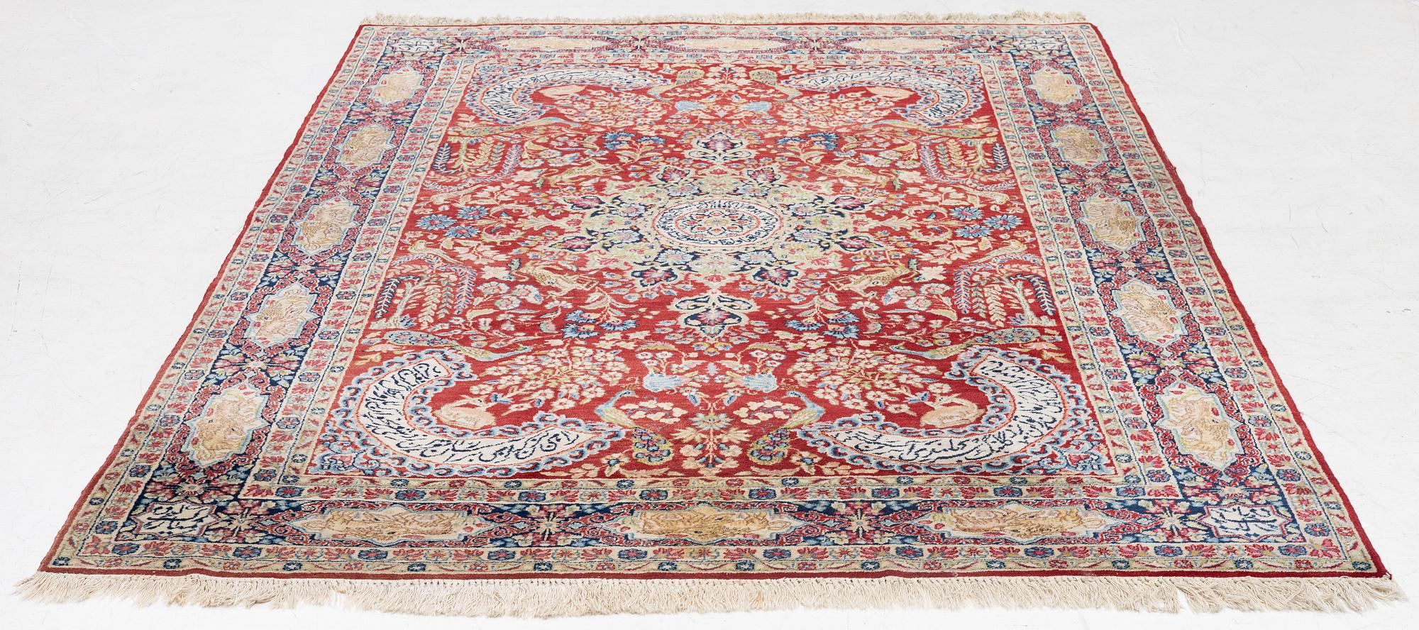 A semi-antique Kirman carpet, c. 275 x 180 cm.