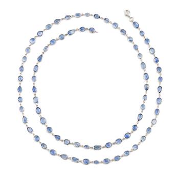 554. An 18K white gold necklace set  with faceted sapphires.