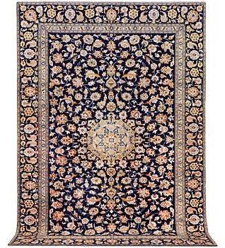 A Kashan carpet, c. 335 x 224 cm.