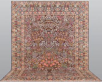 A Kerman Laver carpet, 'Millefleur', approx. 406 x 295 cm.