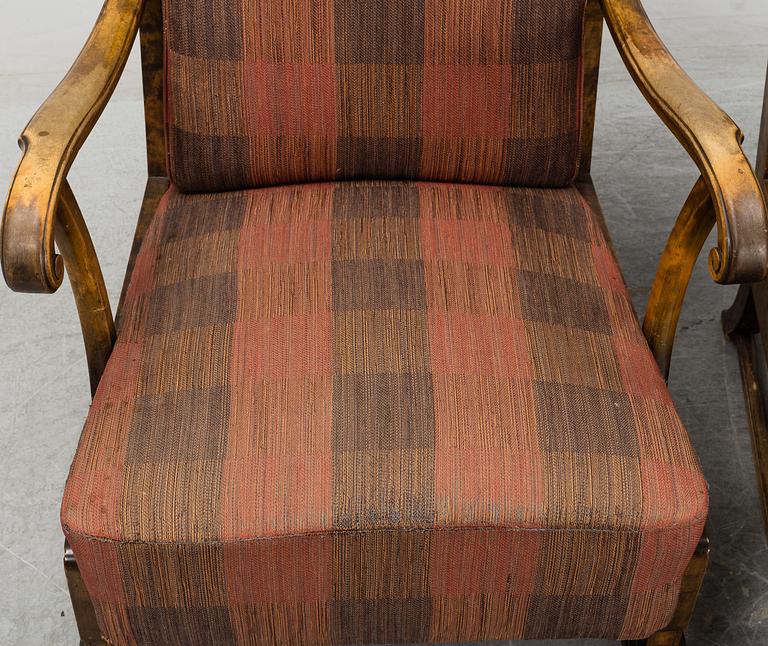 A pair of 1920s easy chairs.