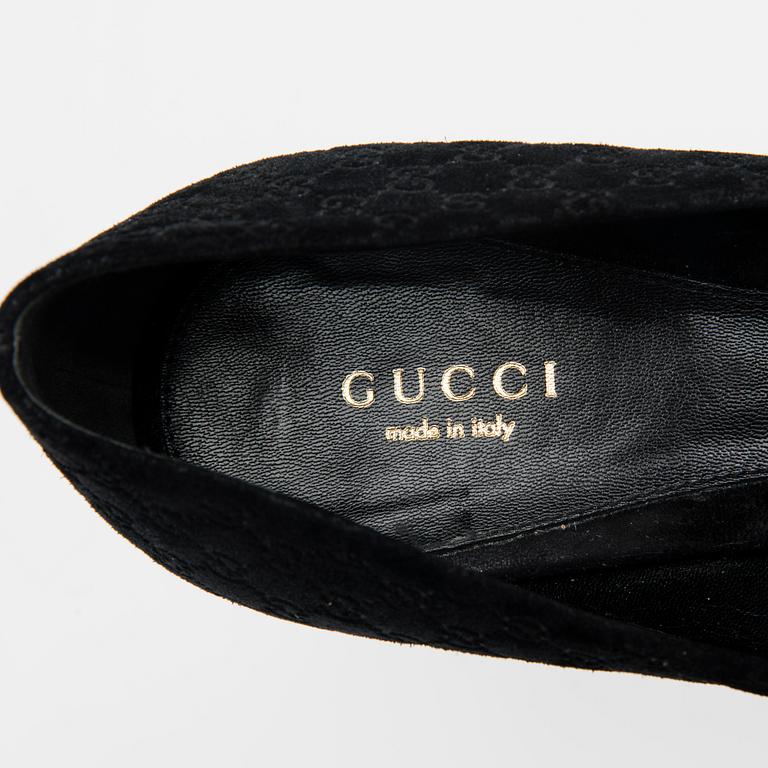 SKOR, Gucci.