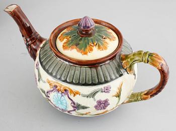 A majolica collection of one coffee pot and three tea pots from Rörstrand, around turn of the century 1900.