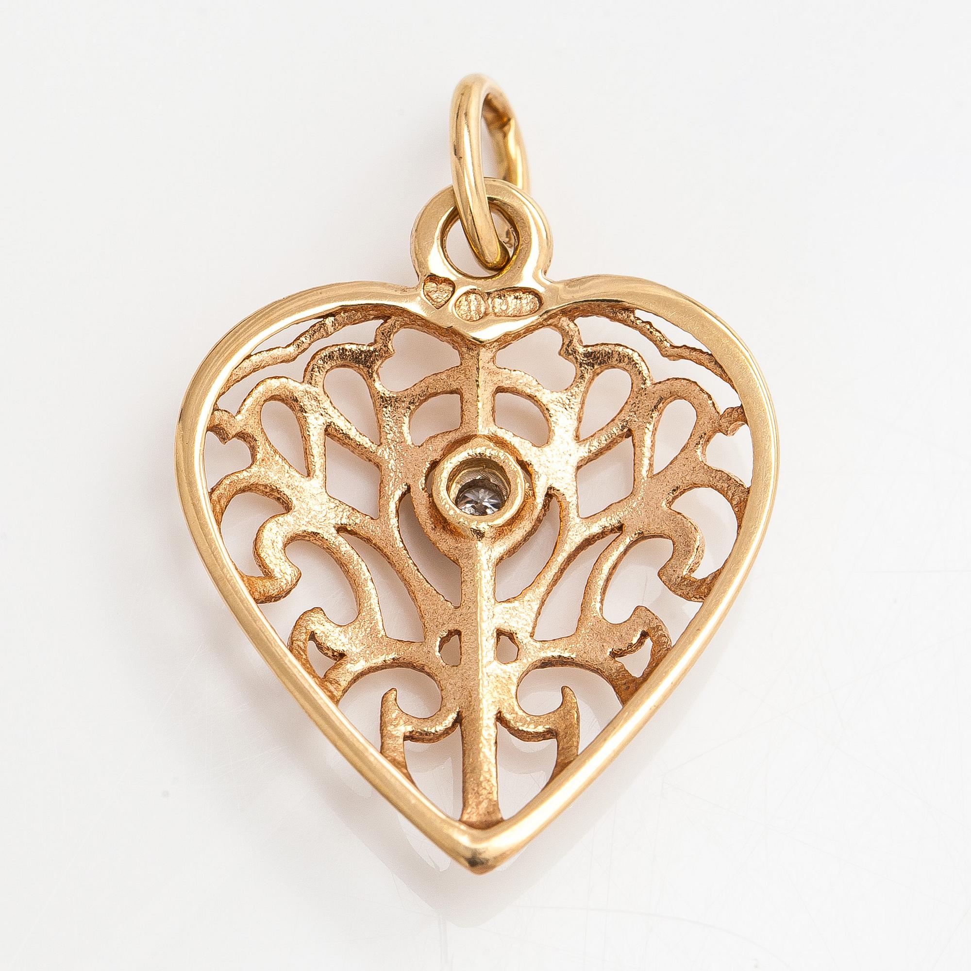 Kalevala Koru, pendant, “Onnen sydän”, 14K gold, small diamond.