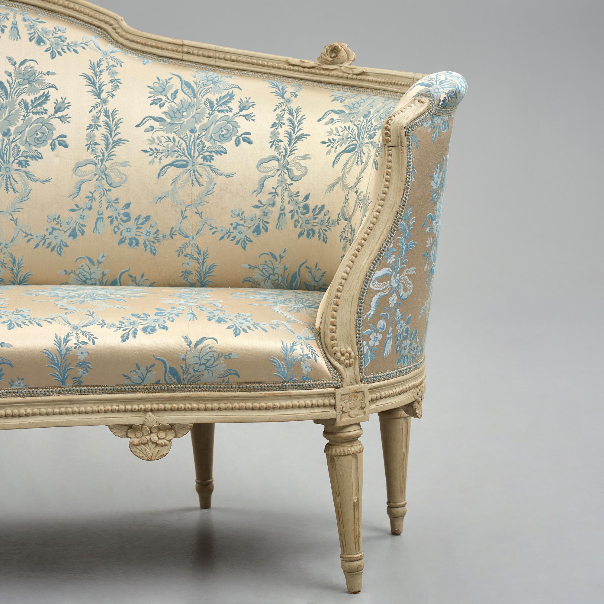 A grey-painted Gustavian 'canapé en corbeille'. sofa, by J E Höglander.
