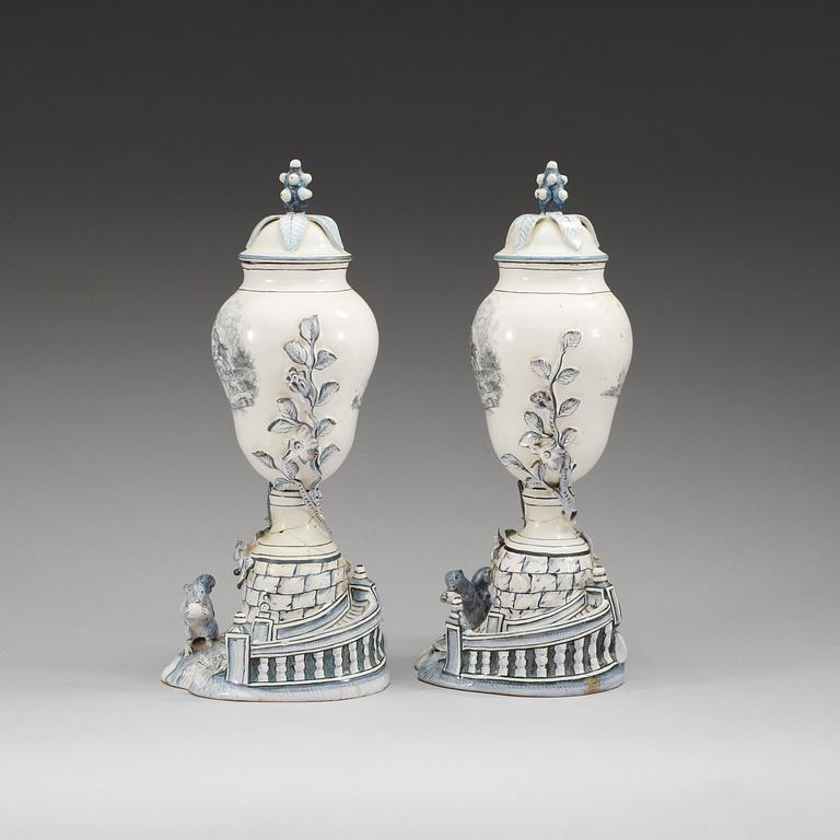 A pair of Swedish Marieberg faience vases with covers, 18th Century.