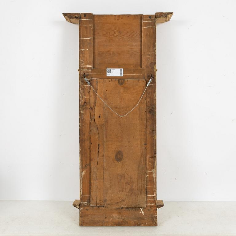 An Empire mirror, 1820.