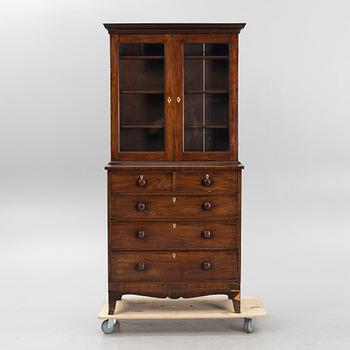 A 19th Century matced mahogany veneered cabinet.