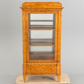 A Swedish first half of the 19th century display cabinet veneered with birch.
