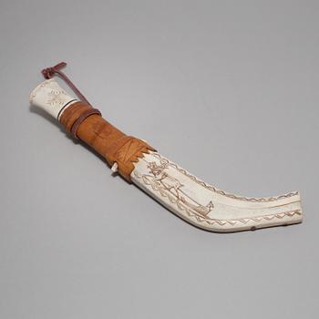 A SAMI KNIFE by Johannes Lauri, Rovaniemi, bone and leather, 20th century.