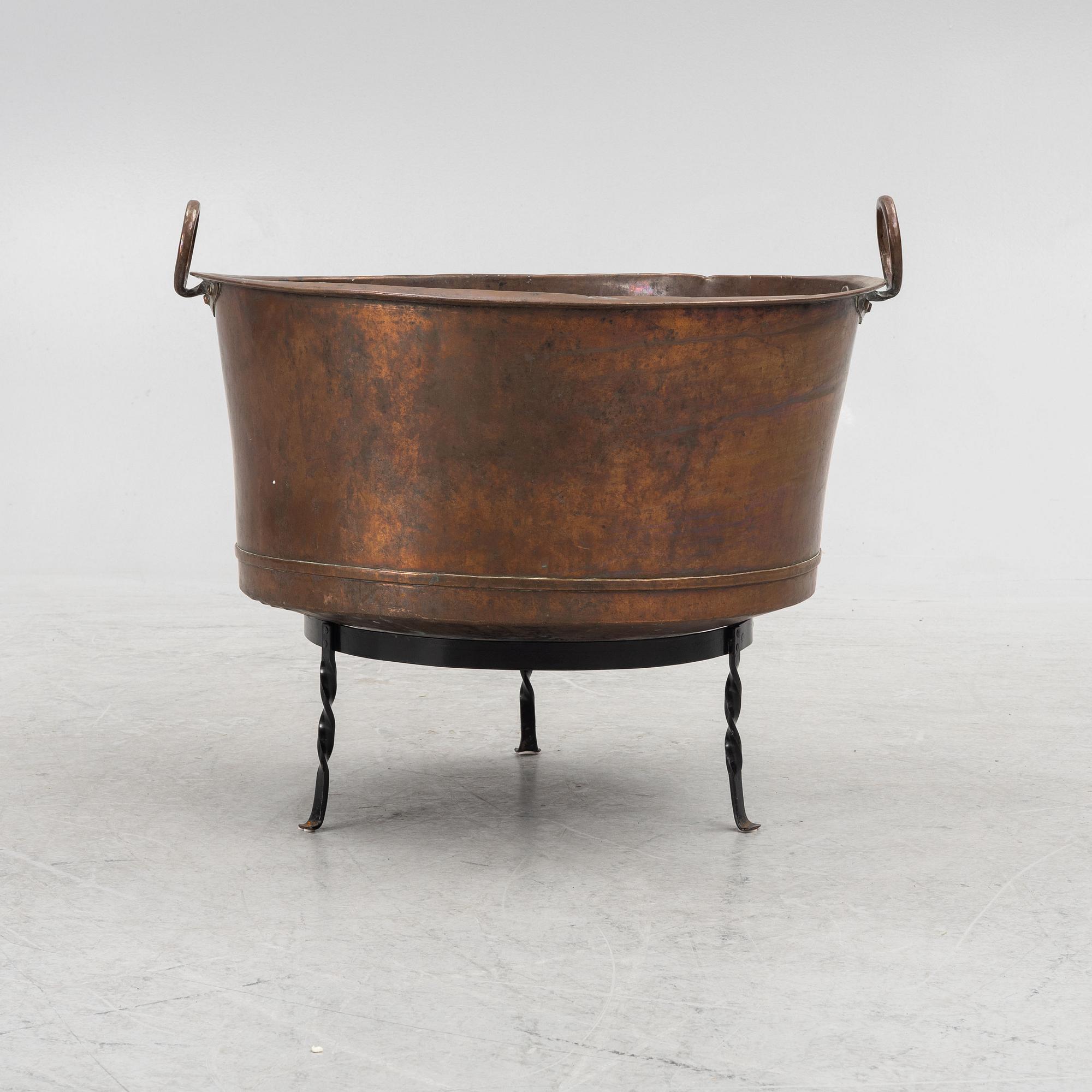 A 19th century copper tub.