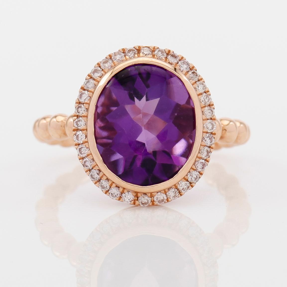 RING, 18K roséguld, diamanter tot ca 0.26 ct. och ametist.