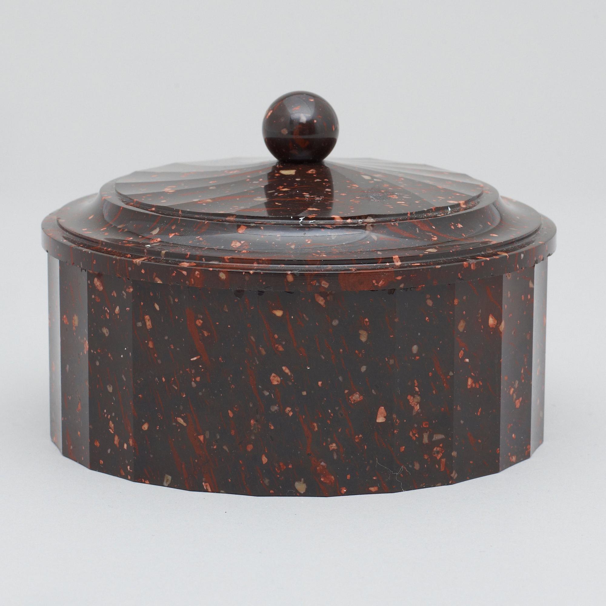 A Swedish Empire porphyry butter box.