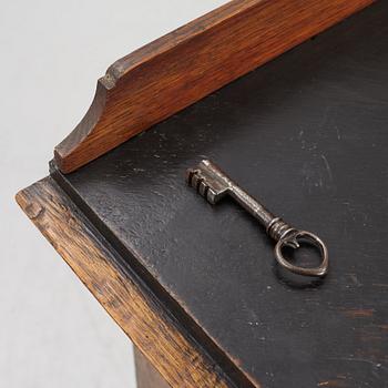 A Baroque corner cabinet, 18th Century.