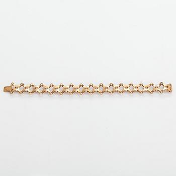 A 14K gold bracelet with synthetic spinels. Pentti KEvätlahti, Turku 1969.