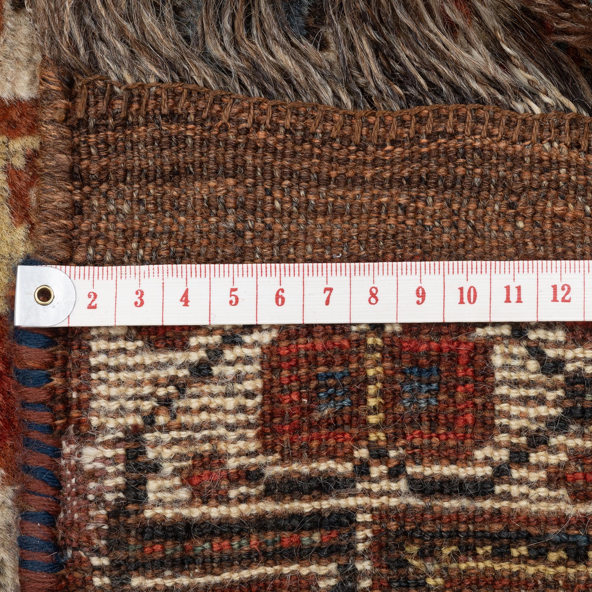 An antique Qashqai rug, southeastern Iran, c. 242 x 170 cm.