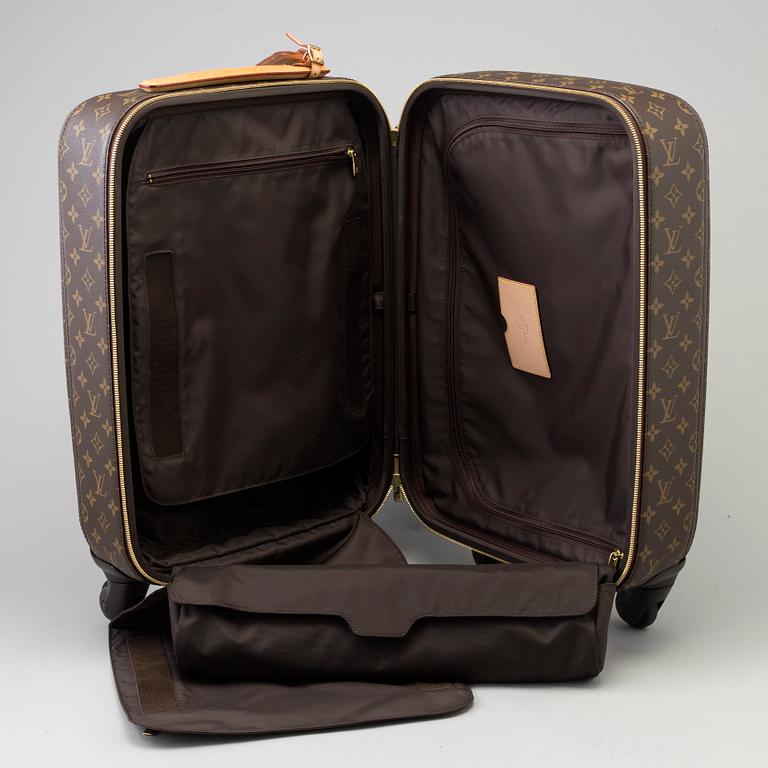 A Monogram Canvas "Zephyr" Suitcase by Louis Vuitton.