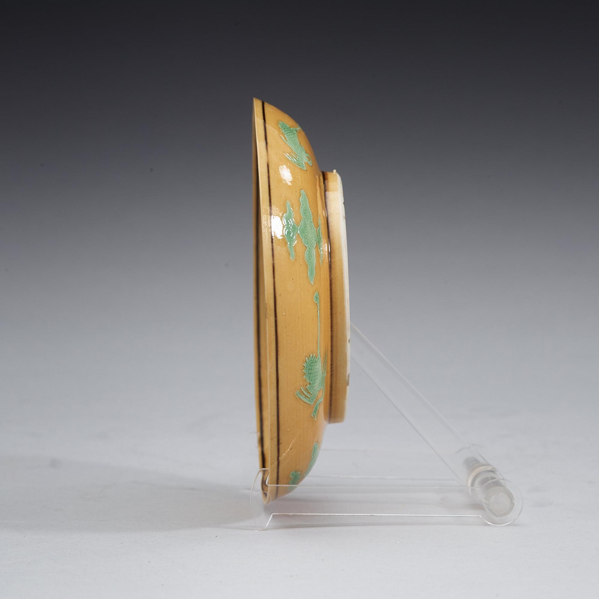 A yellow ground dragon dish, Qing dynasty with Guangxu six character mark and period (1875-1908).