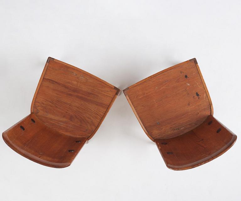 Axel Einar Hjorth, a pair of stained pine 'Lovö' chairs, Nordiska Kompaniet, Sweden 1930s.