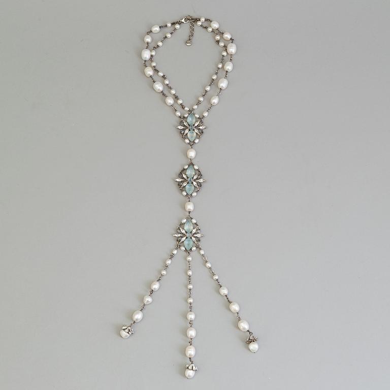 A necklace by Chanel from The Marie Antoinette Coollection 2013, runway piece.