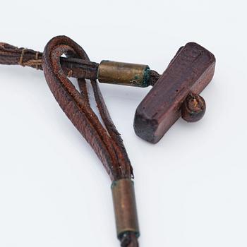 Vivianna Torun Bülow-Hübe, a leather, wood and brass necklace, executed in her own studio, Stockholm ca 1950.