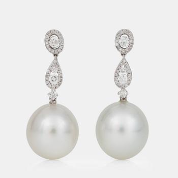 672. A pair of cultured South Sea pearl and brilliant-cut diamond earrings. Total carat weight of diamonds circa 1.15 cts.