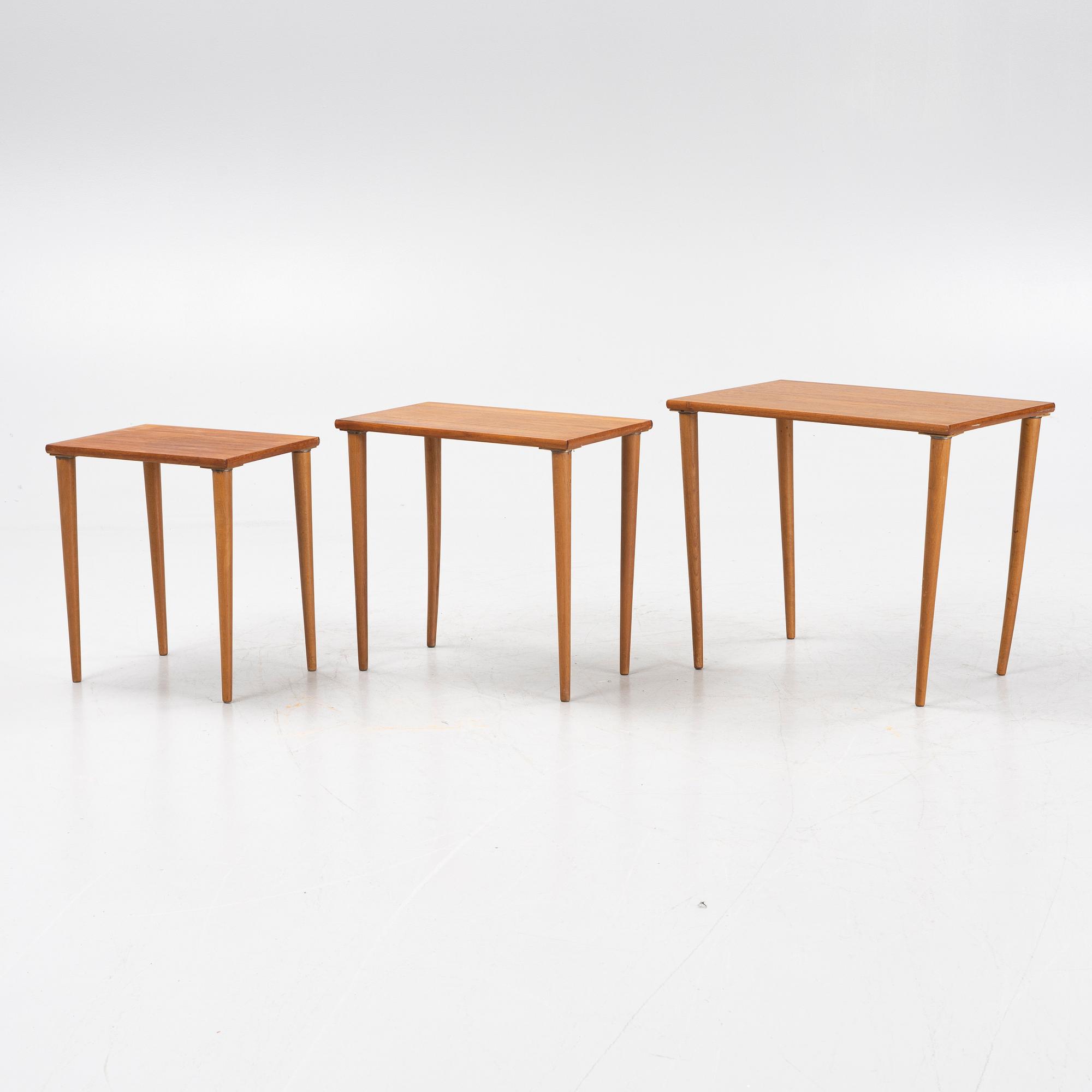 A teak and oak nesting table, 1950s.
