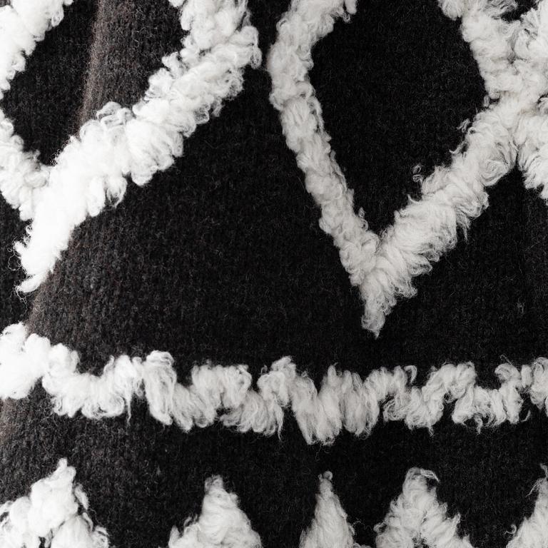 Chanel, a knitted wool dress, french size 34.