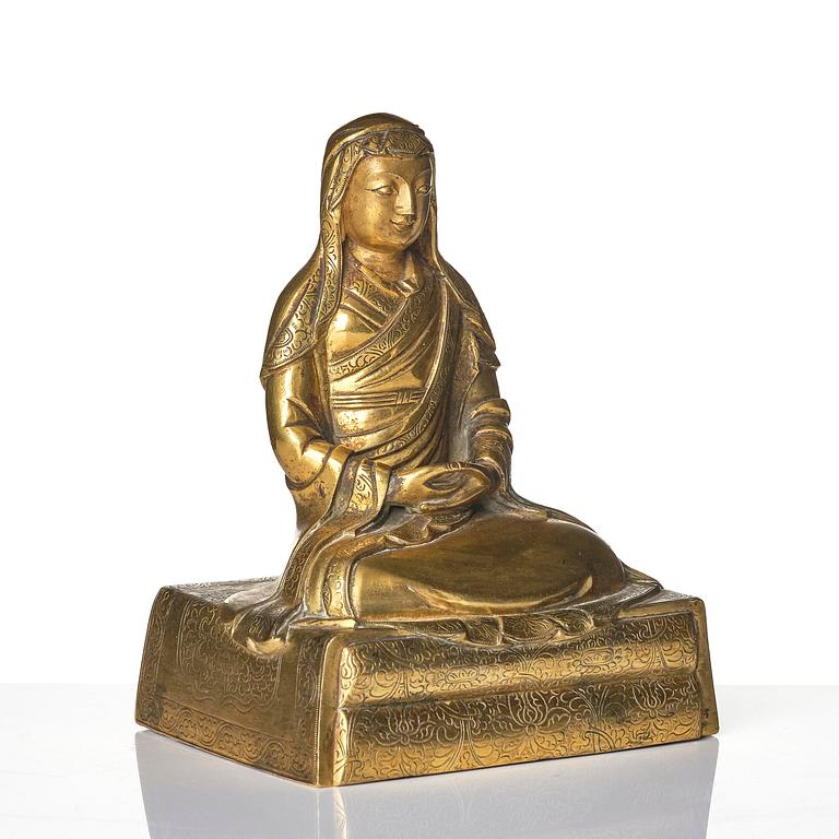 A gilt bronze sculpture of Arhat Ajita, Tibeto-Chinese, 18th century.