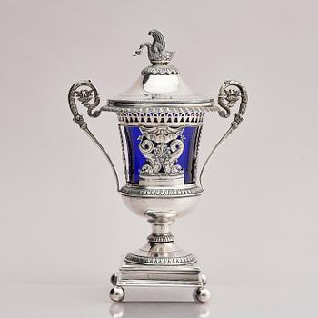 Lockurna, silver med blå glasinsats, Frankrike 1800-talets början.