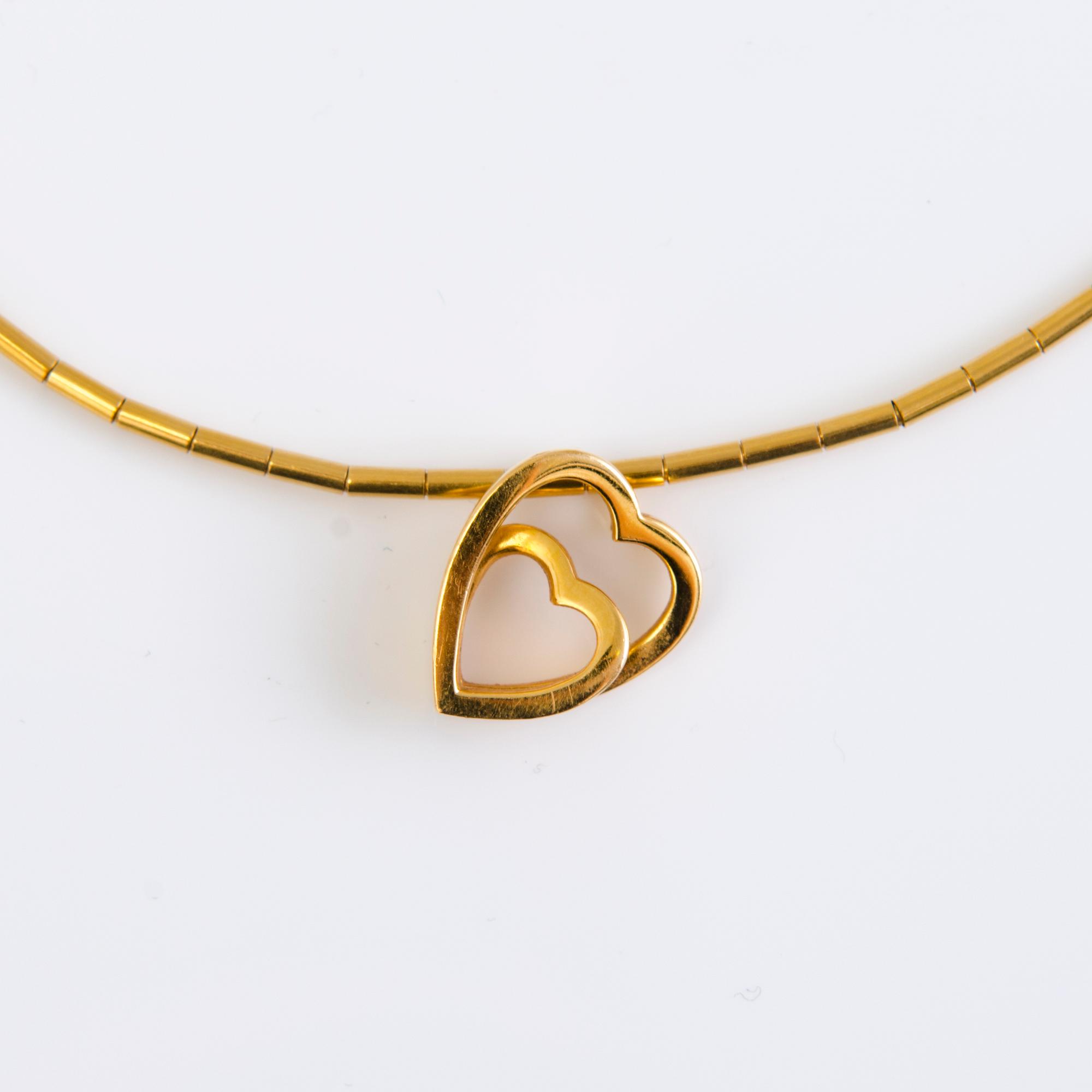 A Cartier 18K gold necklace with heart pendant 1999 and 2001. Certificat and original box.